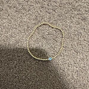 Gold Beaded Bracelet with evil eyes